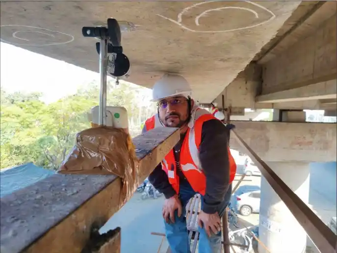 Bridge Load Test using dial gauge to measure deflection on bridge girder