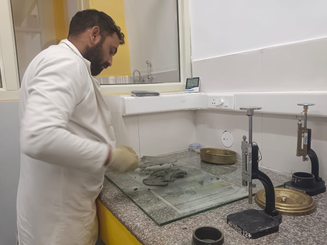 Standard consistency test of Ordinary Portland Cement and Portland Pozzolana Cement using Vicat apparatus in laboratory