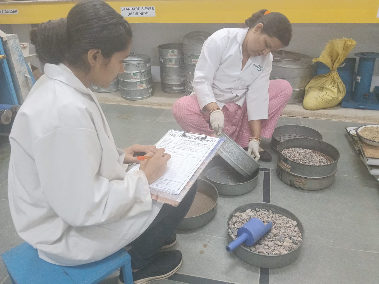 Grain size analysis of soil using dry sieve method showing laboratory recording of particle size distribution as per IS 2720