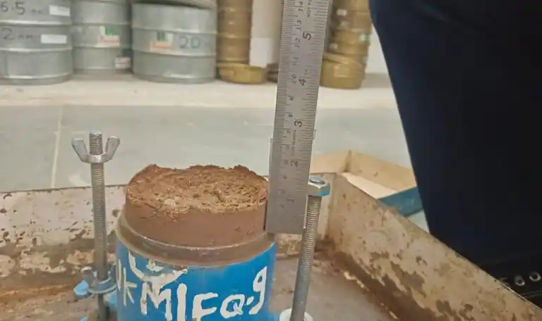 Compacted soil sample prepared during Maximum Dry Density test for determination of MDD and OMC