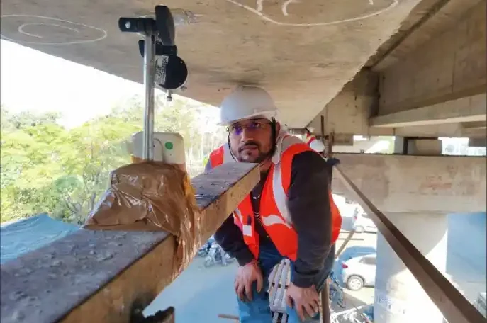 Bridge Load Test using dial gauge to measure deflection on bridge girder