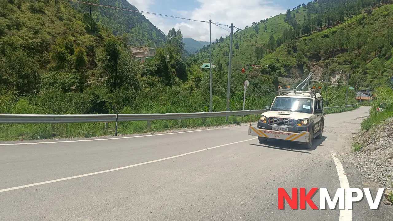 NSV Testing Services: Professional Network Survey Vehicle Solutions 1 Network Survey Vehicle conducting pavement condition testing on a hilly terrain highway