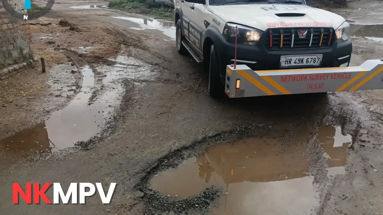 Network Survey Vehicle conducting NSV survey for pavement condition assessment on rural road in Punjab, India